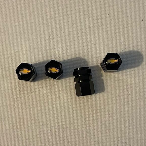 Chevrolet Logo valve Stem caps in black set of 4 NWT - Picture 1 of 4